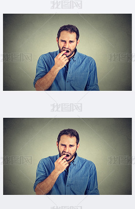 disgusted man with finger in mouth displeased with situation ready to throw up