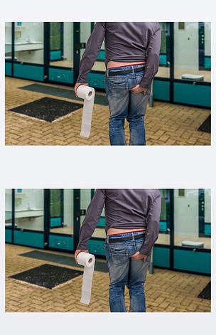 人有腹泻.男人抱着卫生纸和他的屁股.