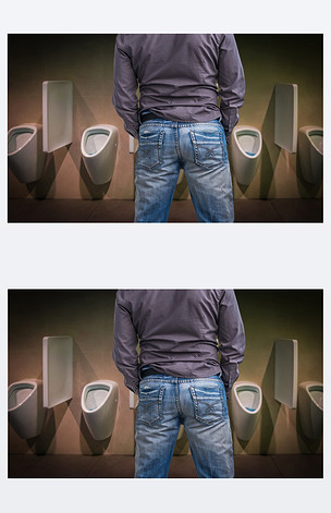 站到小便池在厕所里撒尿的人