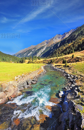 fast roiling river among green mountain