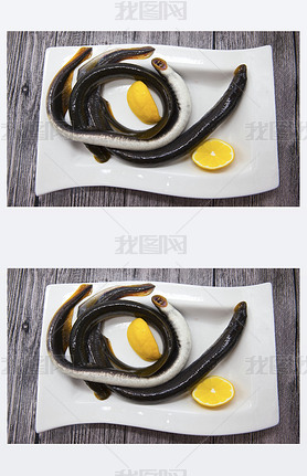 Fresh live fish lamprey on porcelain plate with lemon.