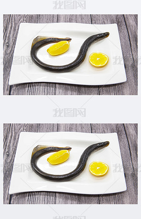 Fresh live fish lamprey on porcelain plate with lemon.