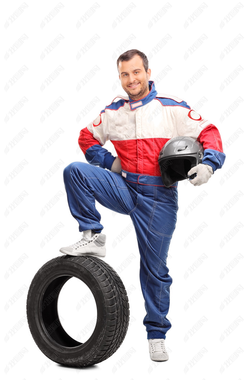 Young car racer holding a helmet 