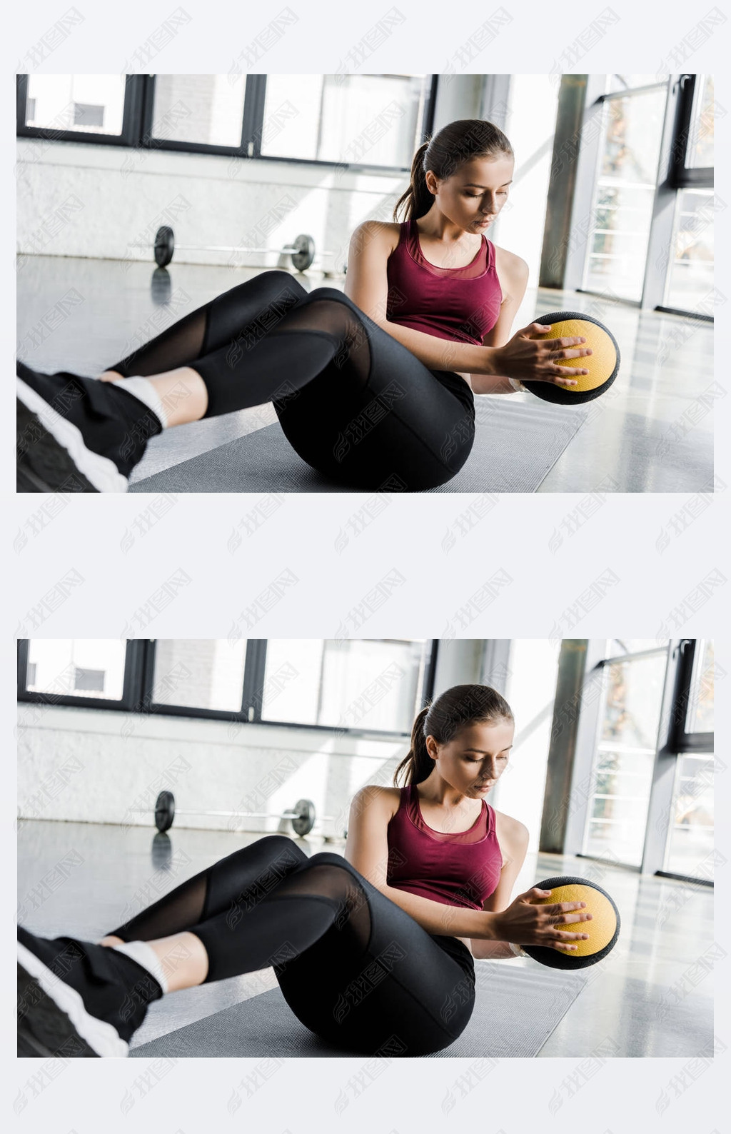 beautiful determined sportswoman working out on abs with medicine ball at sports center