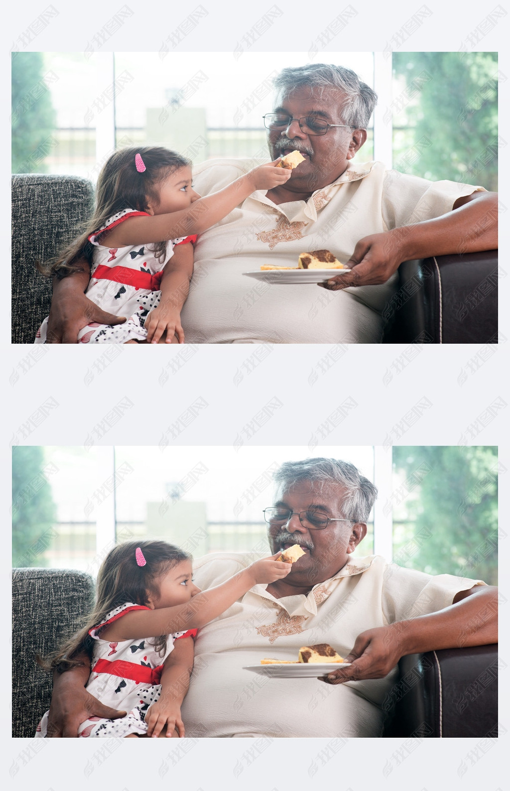 Granddaughter feeding grandfather cake