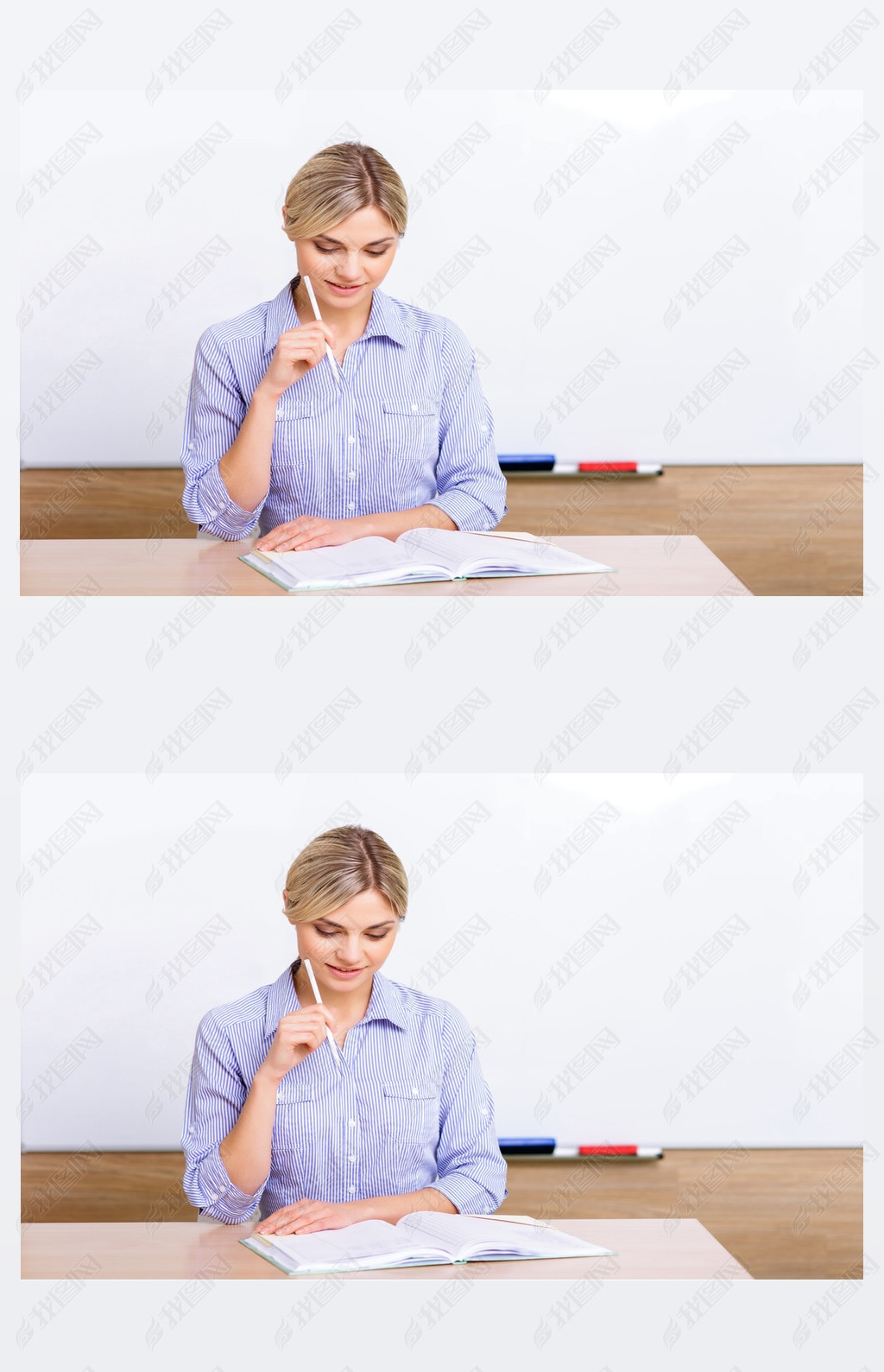 Teacher at the desk checking her register.