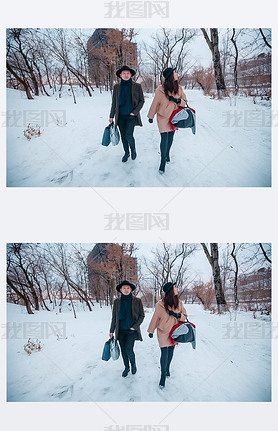 Young hipster beautiful couple in black hats in the winter forest,love,winter vacation in mountains,