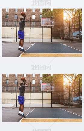 Afro-american basketball player training on a court in New York - Sportive man playing basket outdoo