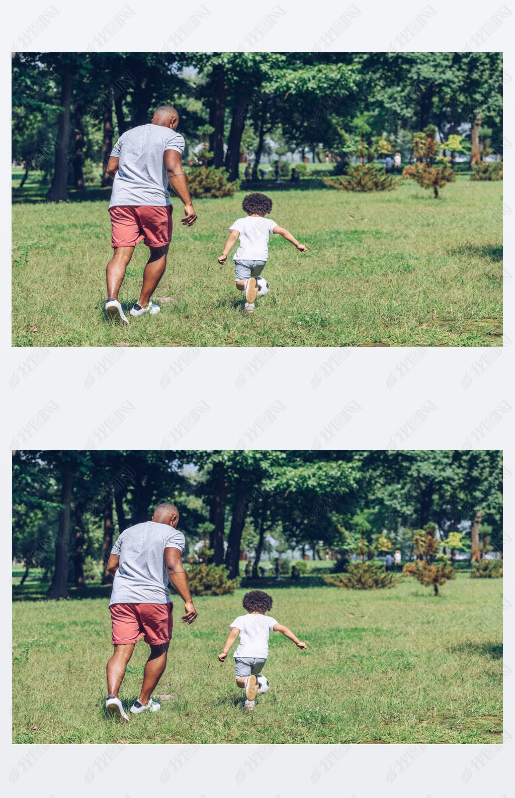 back view of african american father and son playing football in park