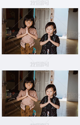 welcome greeting from two asian little girl