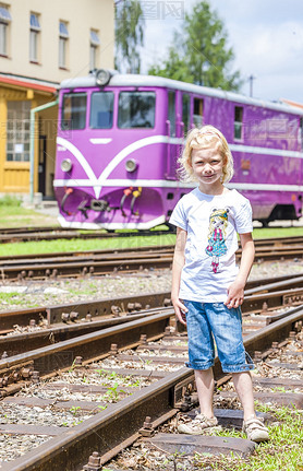 Little girl at railway station of Nova Bystrice