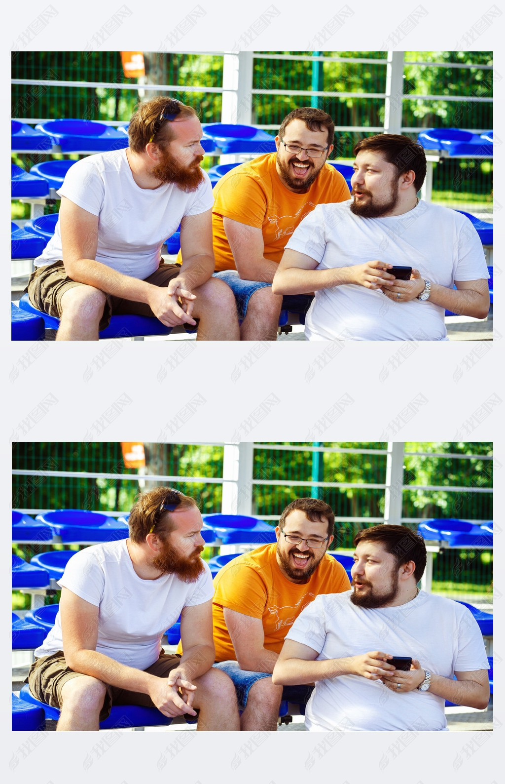Three male friends are watching mobile phone video and laughing sitting at summer day at stadium bac