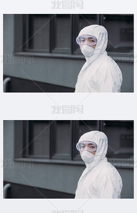 asian epidemiologist in hazmat suit and respirator mask looking at camera while standing on street