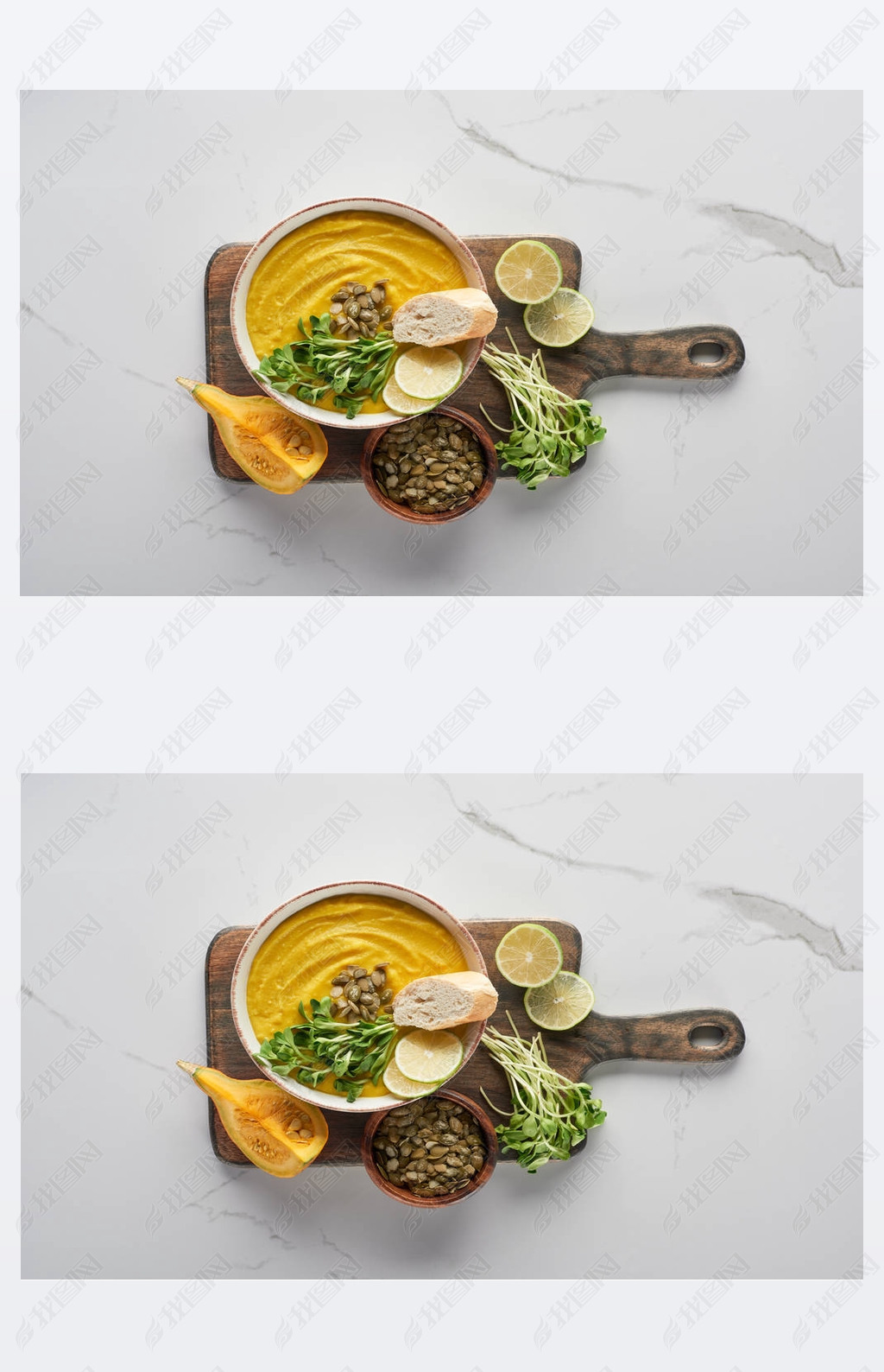 top view of delicious mashed pumpkin soup on wooden cutting board on marble surface with ingredients