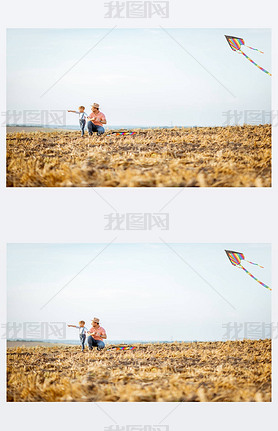 Fother and son flying kite on the field