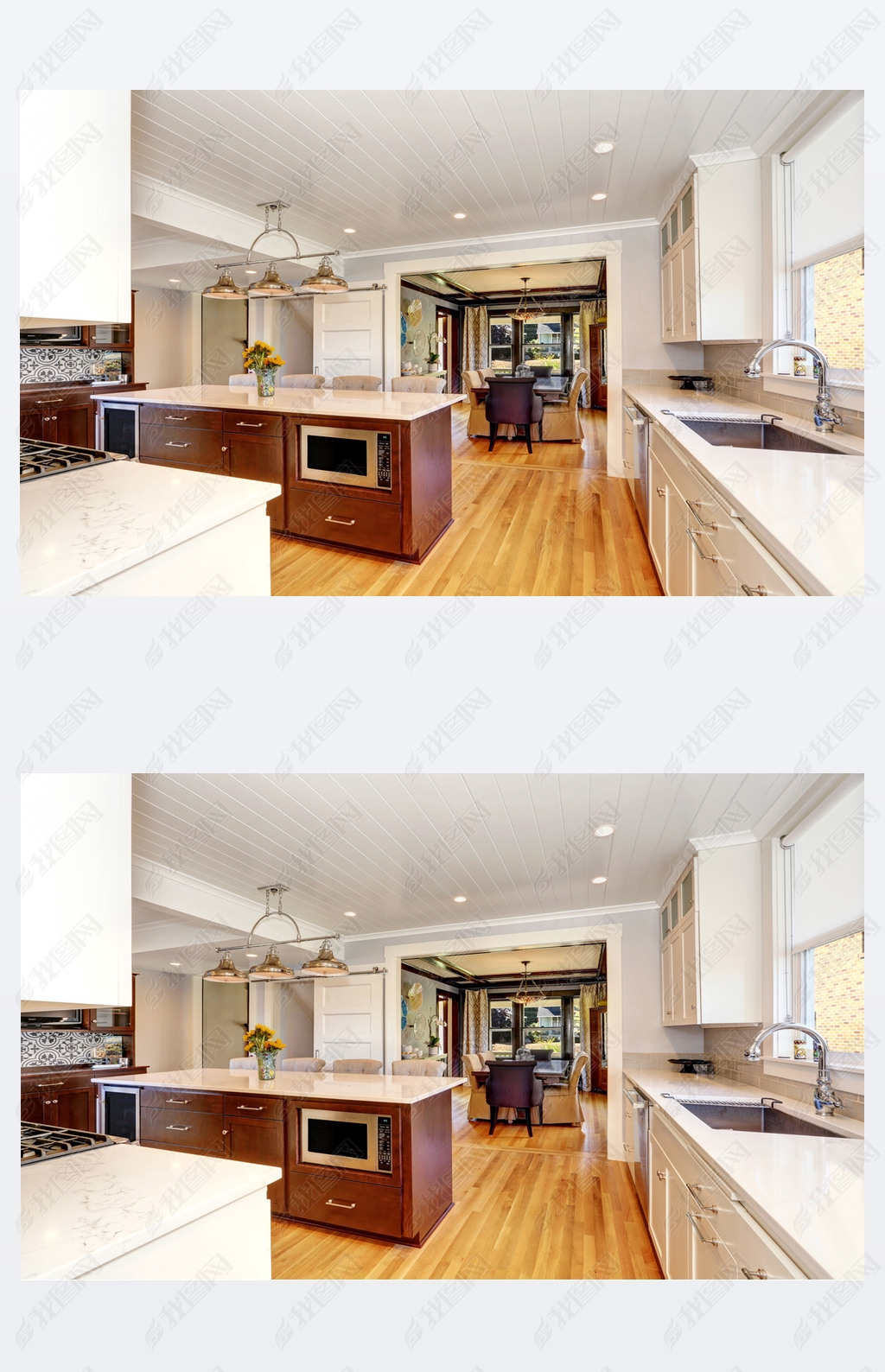 White interior of kitchen room with large kitchen island.