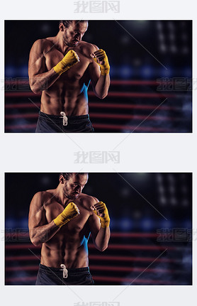 Strong muscular boxer in red boxing gloves. A man in a boxing 