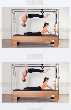 Pilates aerobic instructor woman and man in cadillac fitness exercise