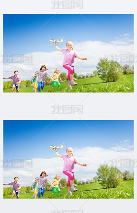 girl holds airplane with kids running