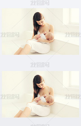 Young mother feeding breast her baby at home in white room near 