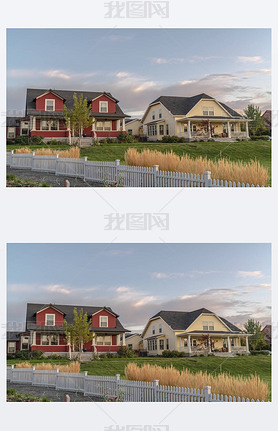 White picket fence with ornamental reeds near sunset