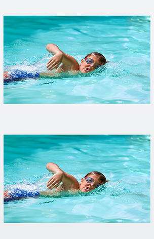 男孩在游泳池练习自由泳.