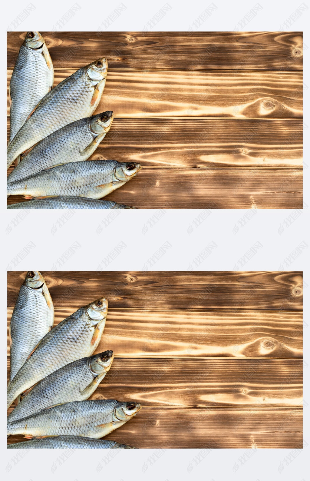 dry fish on a wooden background with space for text