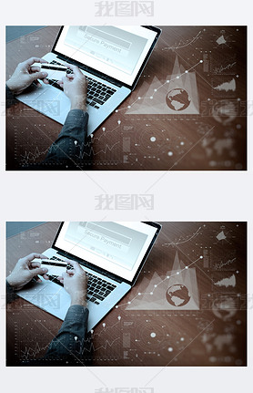 top view of hands using laptop and holding credit card with blan