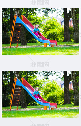 Little girl sliding on a playground