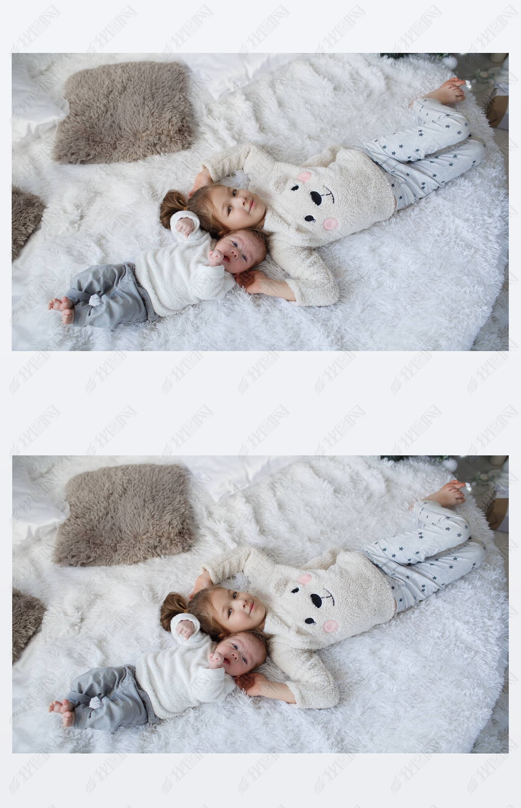 小女孩拥抱一个新生的小弟弟小女孩和男婴弟弟和妹妹