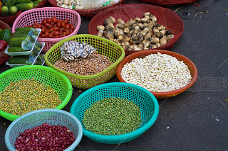 Various colorful beans at plastic basket at Ho Chi Minh City local market
