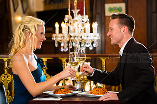 happy couple have a romantic date in restaurant