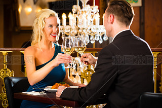 happy couple have a romantic date in restaurant