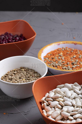 bowls with beans and seeds. Top view and copy space