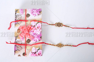 ӡȽڣRaksha BandhanŵRakhi  Rice GrainsKumkum ӡȴͳֵܽü䰮.