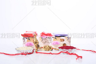 ӡȽڣRaksha BandhanŵRakhi  Rice GrainsKumkum ӡȴͳֵܽü䰮.