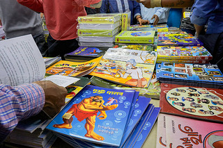 KOLKATA, INDIA - FEBRUARY 11TH, 2018: Bengali (Indian langualge) colourful books for sale at Kolkata