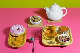 Tea with dessert on a bright colored background