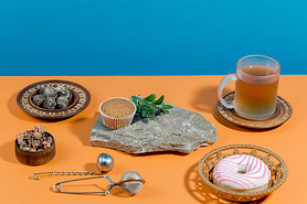 Tea with dessert on a bright colored background