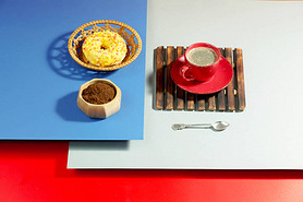 Coffee with dessert on a bright colored background