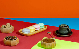 Coffee with dessert on a bright colored background