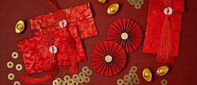 Chinese new year festival decoration over red background. Traditional lunar new year red pockets, pa