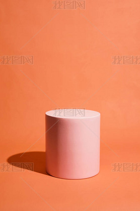 product platform arrangement in pink pastel color in minimalist style. trendy display layout with an