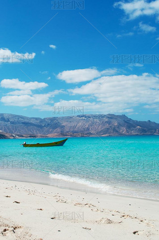 Socotra, Yemen, Middle East: the breathtaking landscape with a boat on the beach of Ras Shuab, Shuab