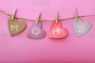 Mothers day message on paper hearts