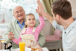 Cute family has a dinner in cafe