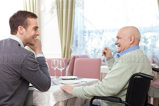 Friendly family is resting in cafe