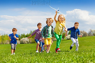 happy running kids with airplane toy