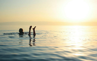 Woman swimming in salty water