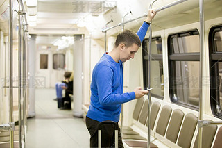 Young passenger in subway train